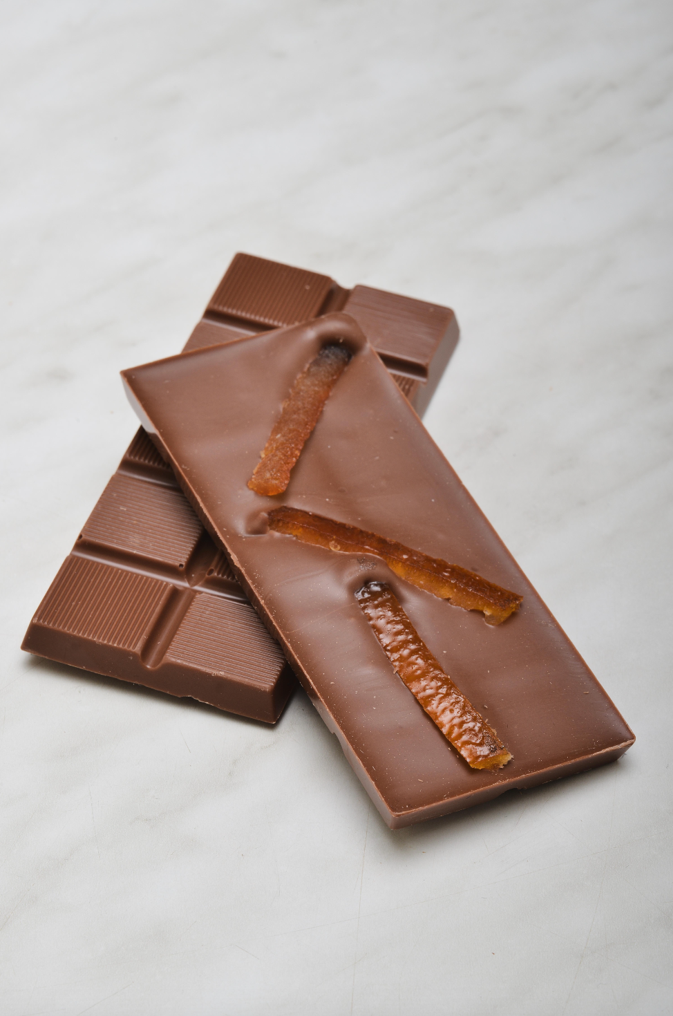 Chocoladereep met topping: orangette - melkchocolade 45g (uit collectie)