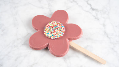 Bloemetje chocolade groot ruby op stokje