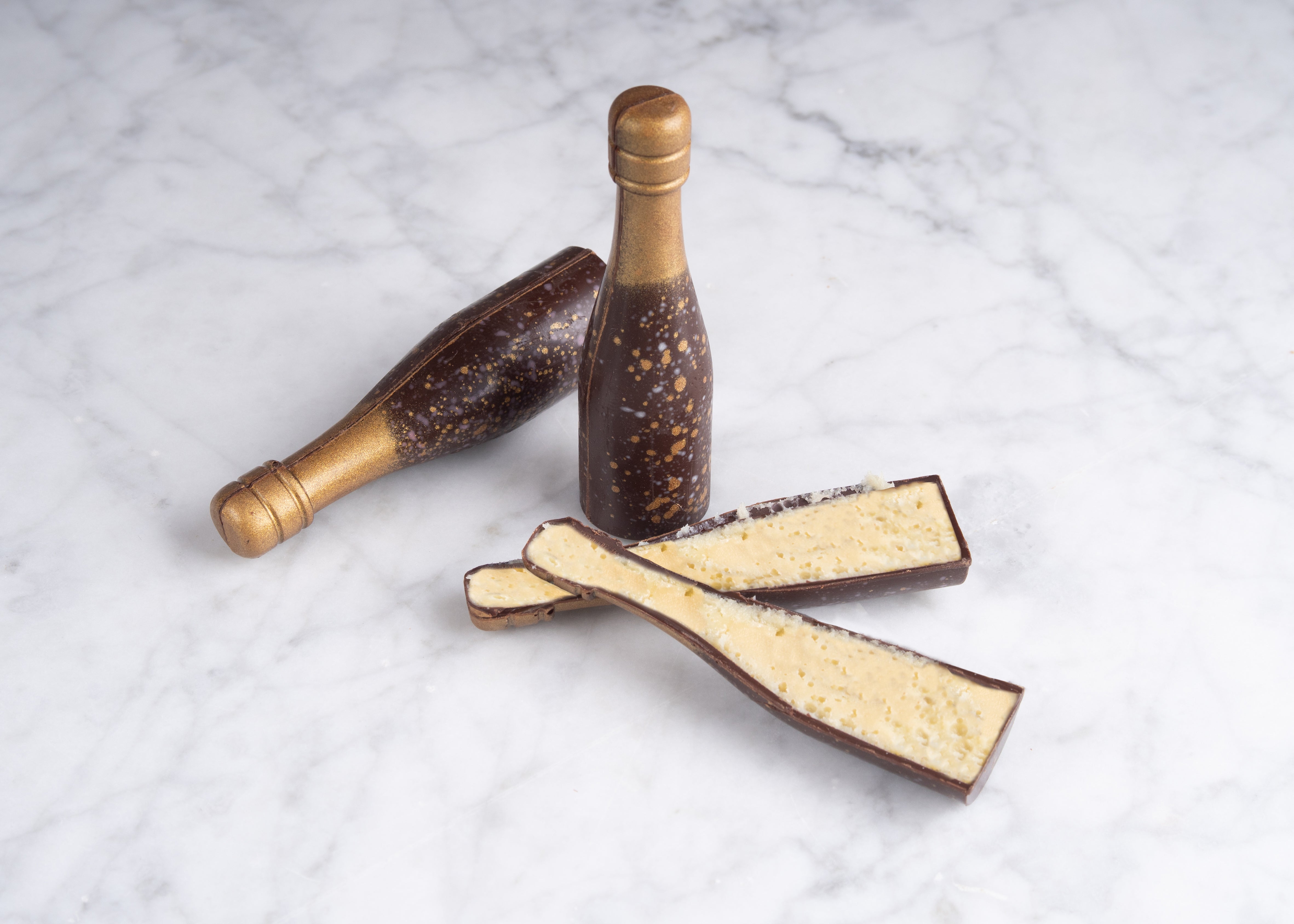 Champagne fles praline in ijsemmertje