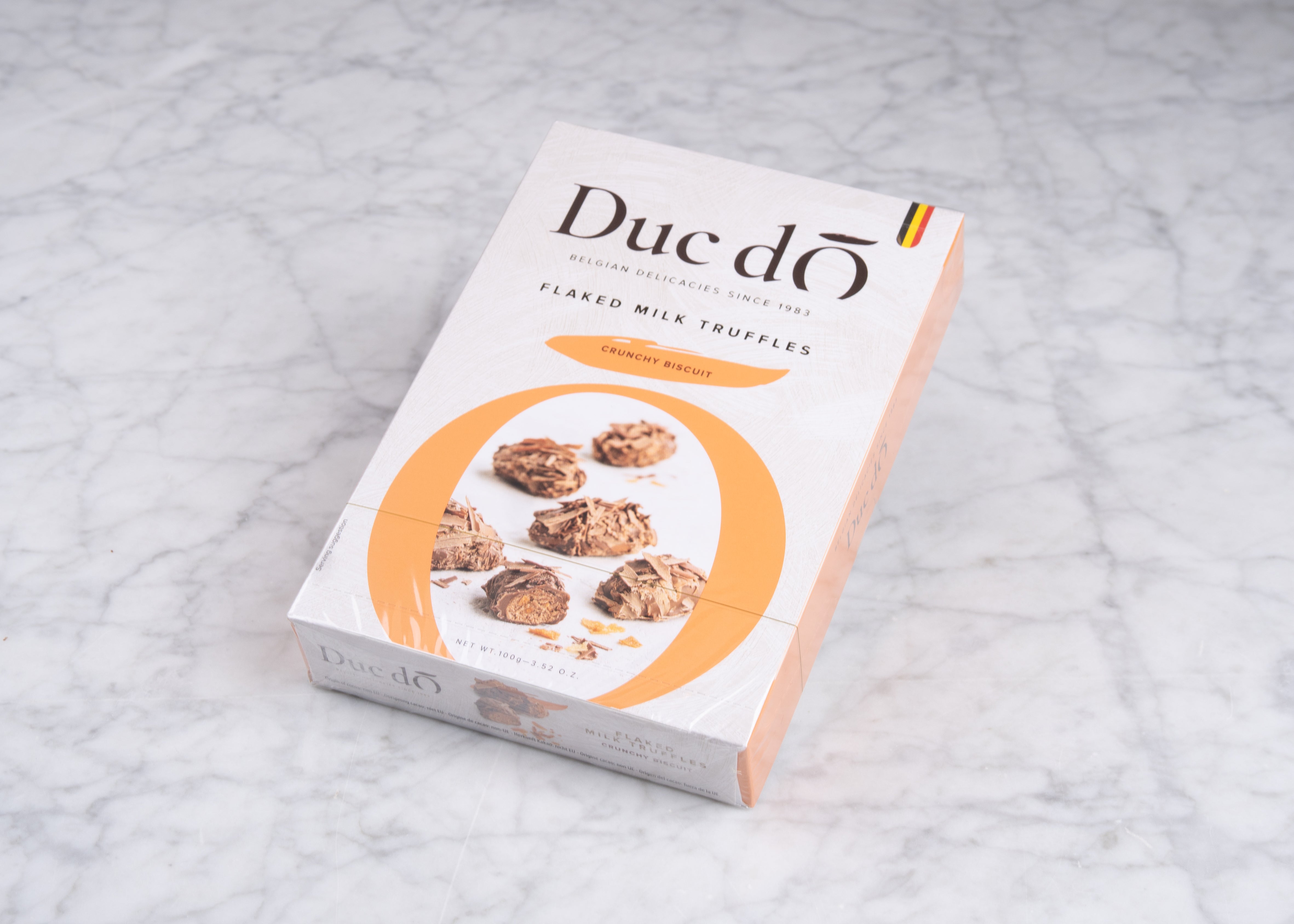Duc d'O: Flaked milk chocolate truffles - crunchy biscuit 100g