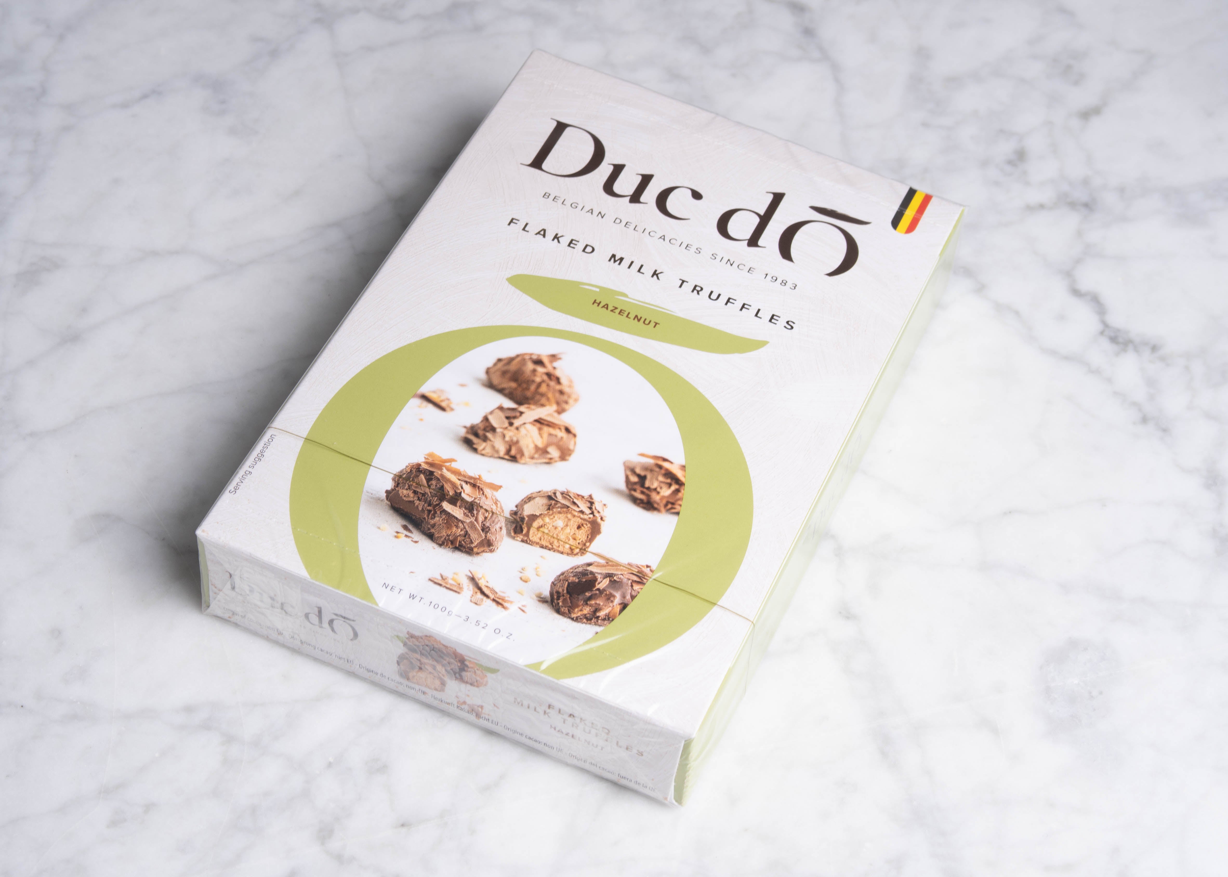 Duc d'O: Flaked milk chocolate truffles - hazelnut 100g