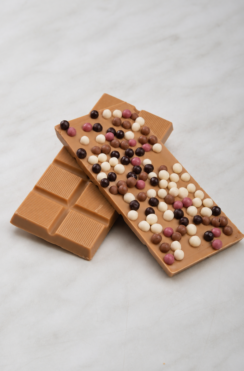 Chocoladereep met topping: crisppearls - gold chocolade 45g